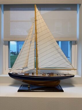 Classic Wooden Model Sailboat with White Sails